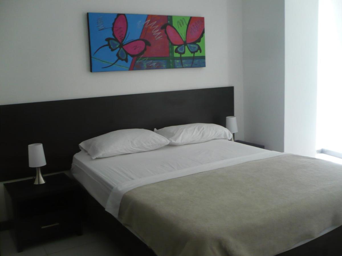 Apartasuites San Marcos Cali Habitación foto